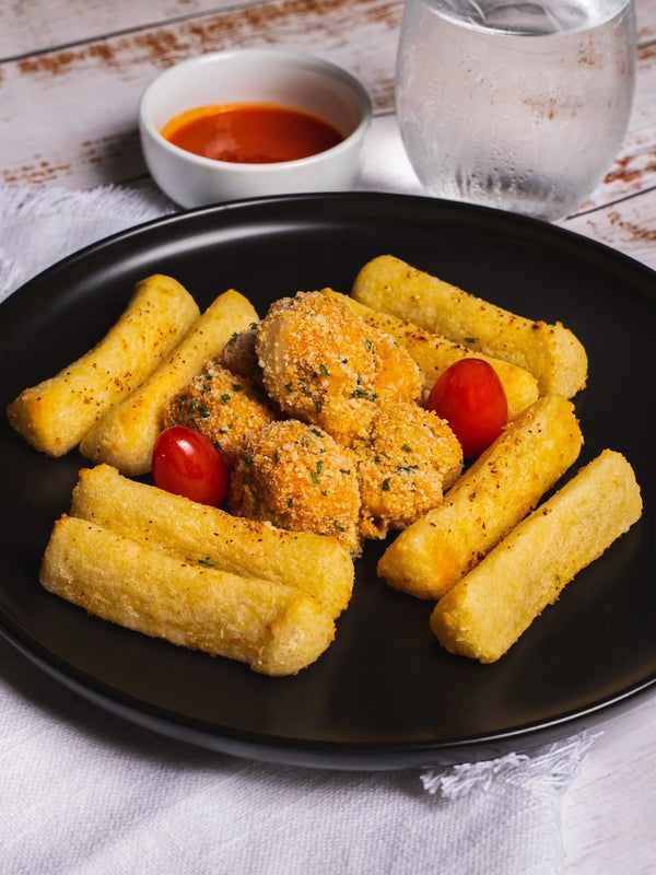 Buffalo Cauliflower Florets with Yucca Fries and Carrots Coins